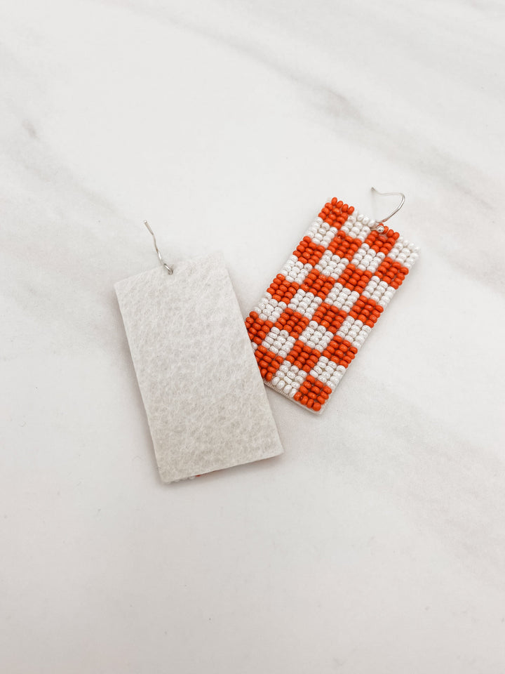 Beaded Orange and White Checkerboard Dangle Earrings