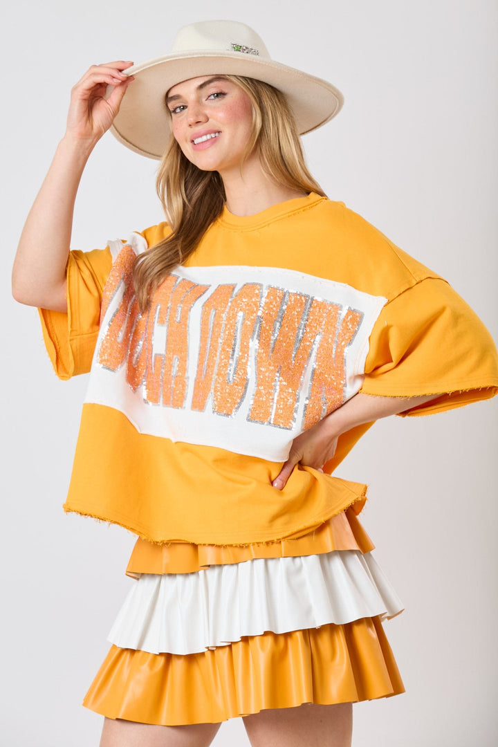 Fantastic Fawn Color Block Loose Fit Short Sleeve Top with Sequin Embroidered "Touch Down"