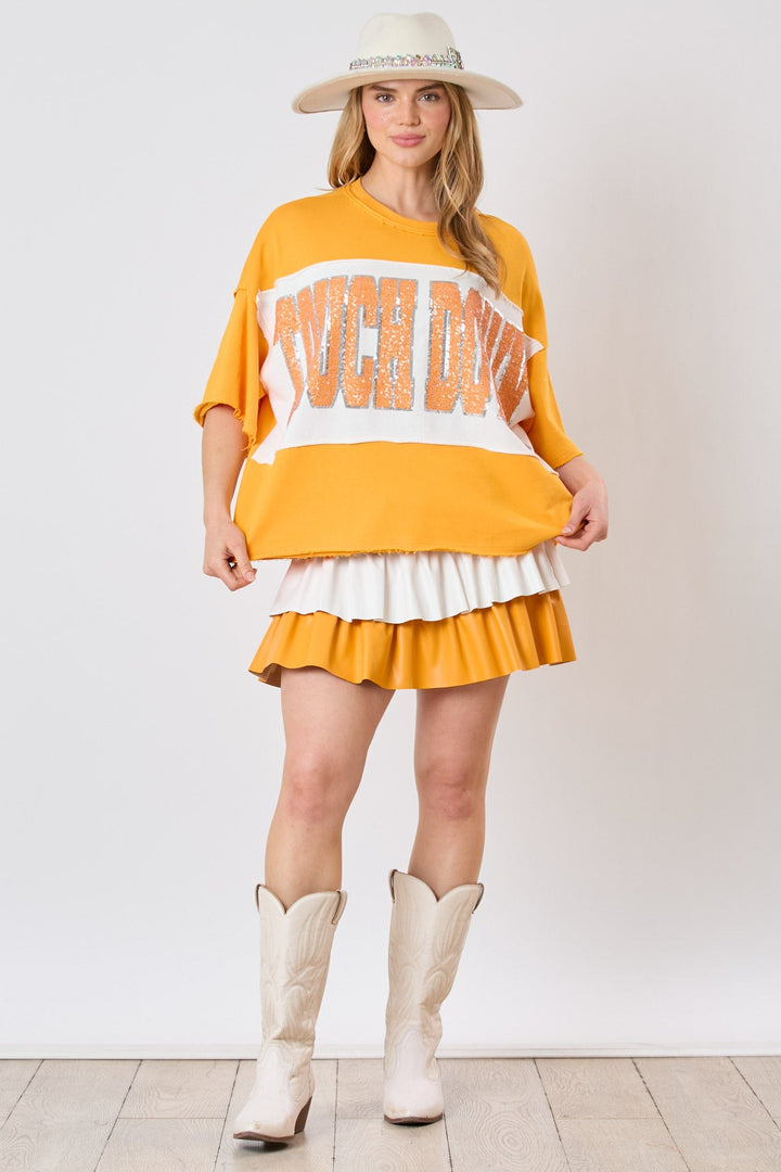 Fantastic Fawn Color Block Loose Fit Short Sleeve Top with Sequin Embroidered "Touch Down"