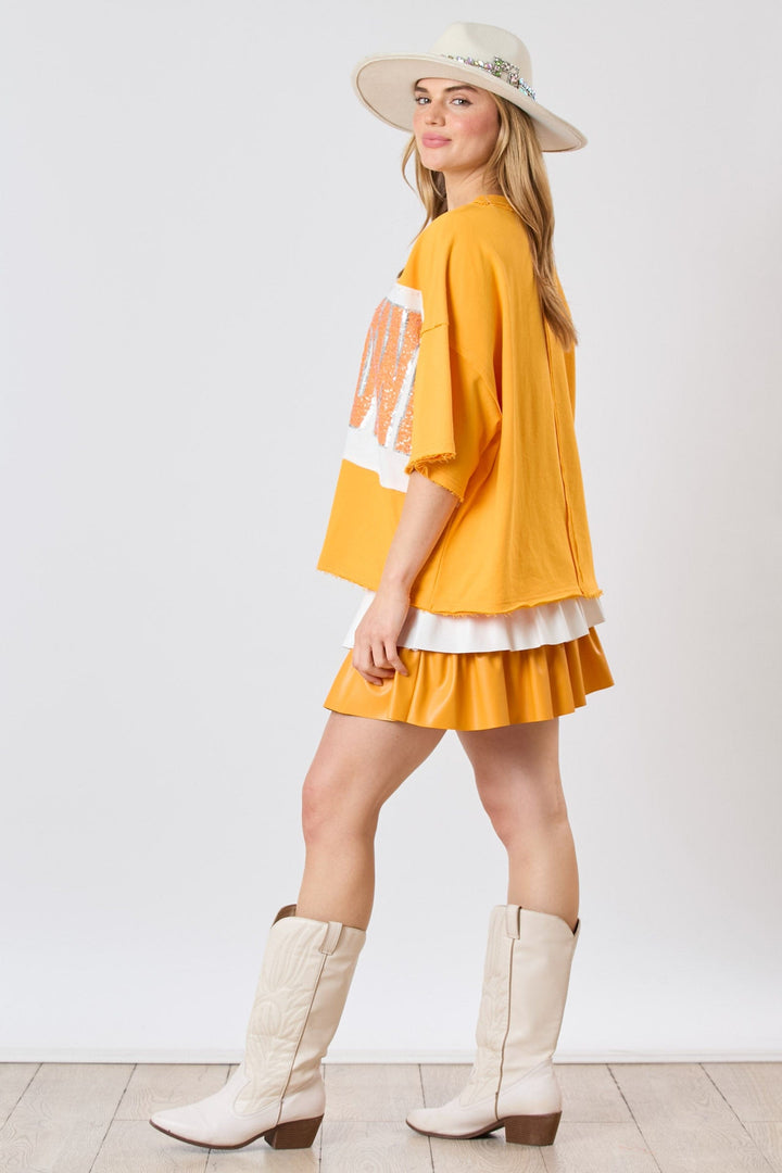 Fantastic Fawn Color Block Loose Fit Short Sleeve Top with Sequin Embroidered "Touch Down"