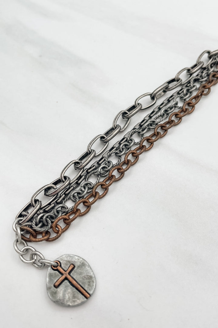 Multi Metal 4 Strand Chain Bracelet with Cross Dangle