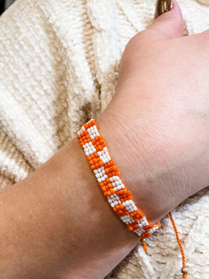 Beaded Orange and White Checkerboard Adjustable Bracelet