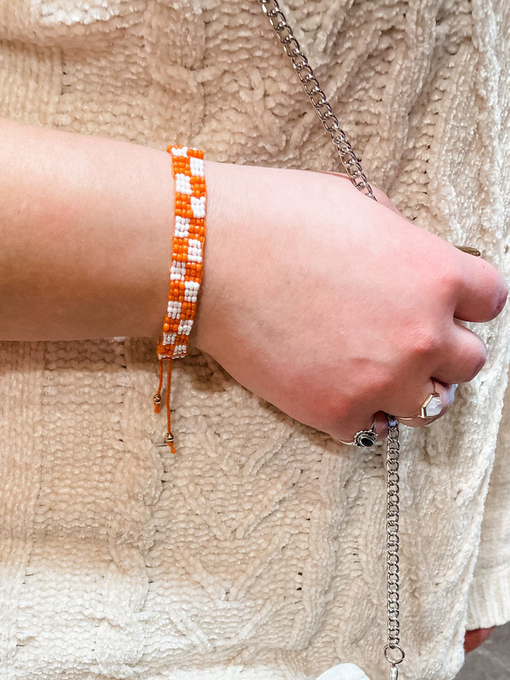 Beaded Orange and White Checkerboard Adjustable Bracelet