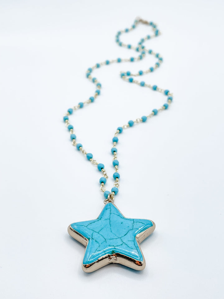 Blue Star Pendant on Blue and Gold