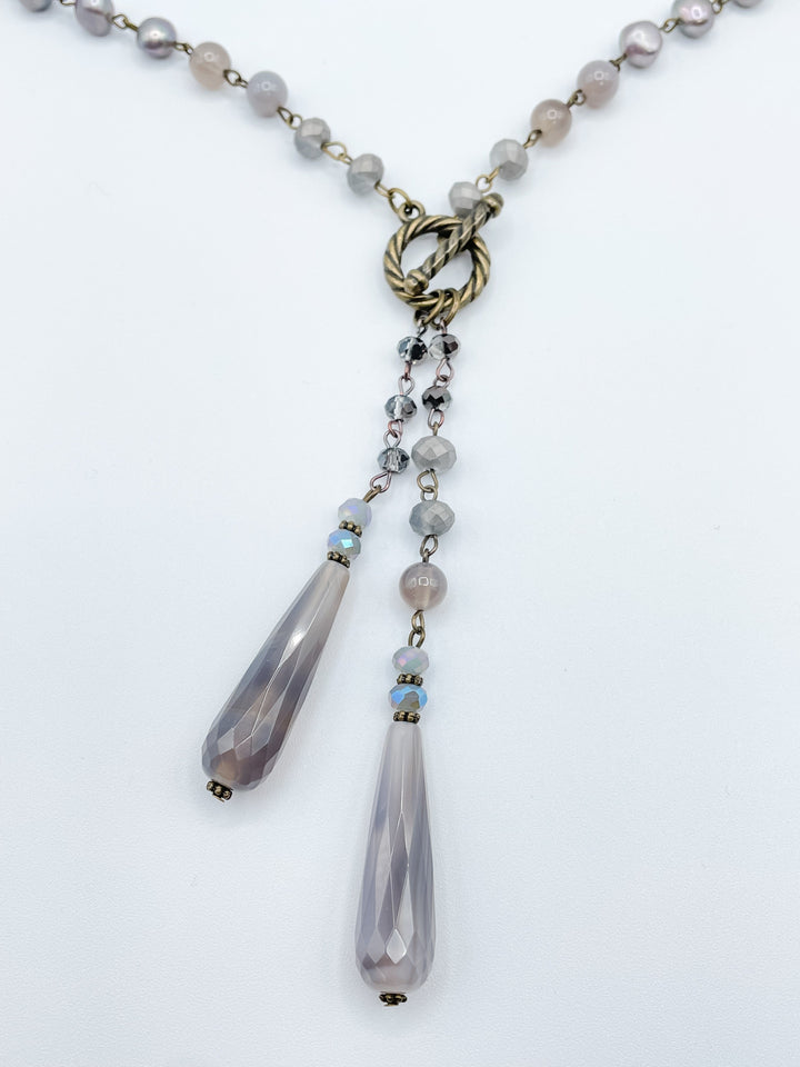 Long Beaded Necklace with Two Crystal Drop Features